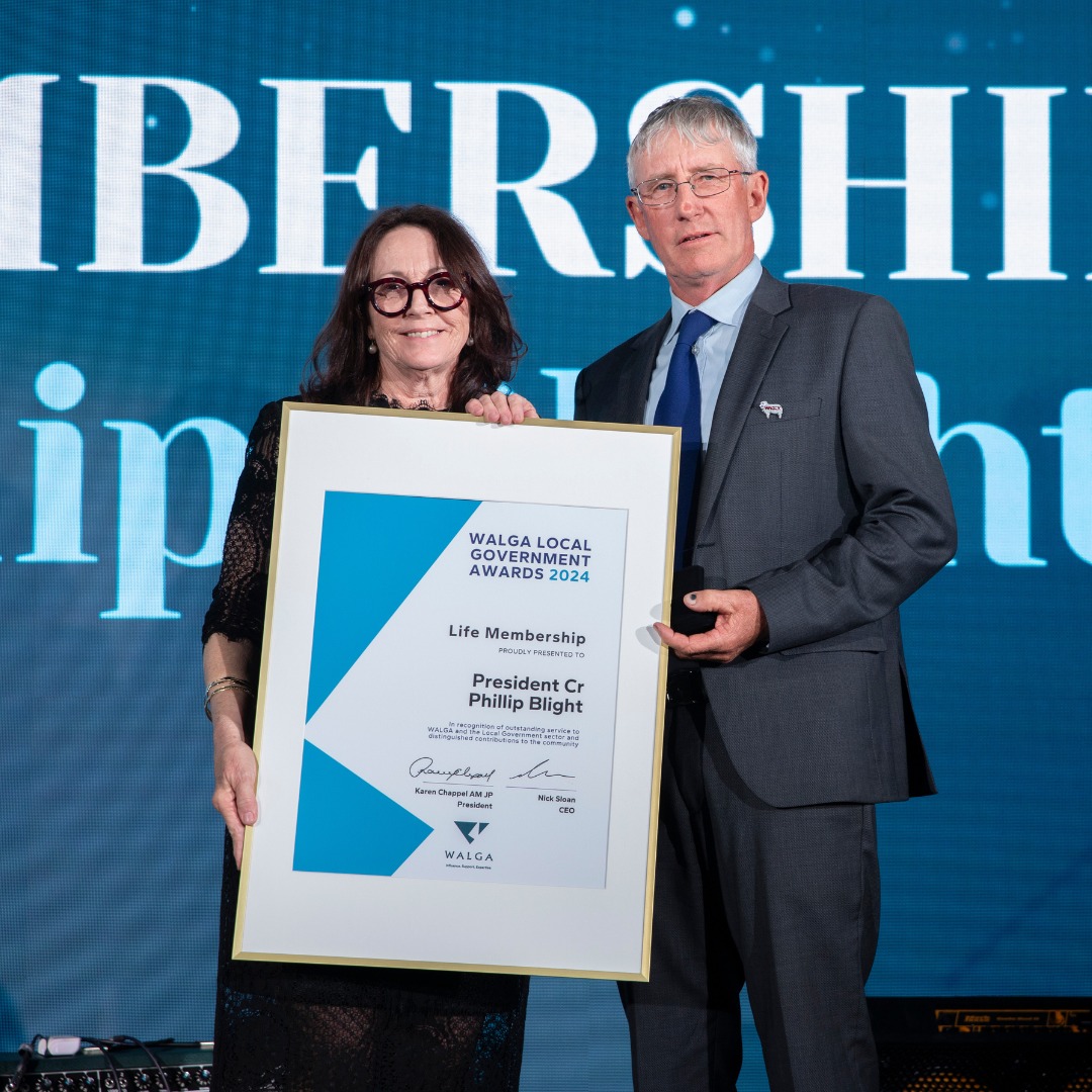 WALGA President, Cr Karen Chappel presents President Phil Blight with WALGA Life Membership at 2024 WALGA Awards in recognition of outstanding service to WALGA and the Local Government sector and distinguished contributions to the community.